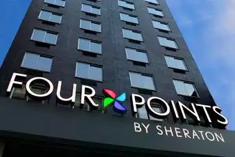 Four Points by Sheraton hotel exterior with signage.