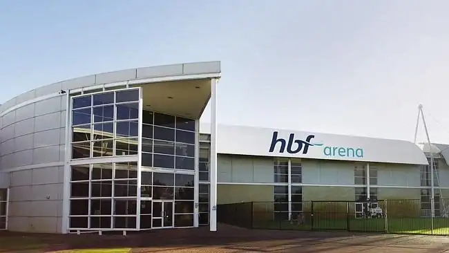 Hbf arena building exterior with modern architecture and large glass windows showcasing business facilities.