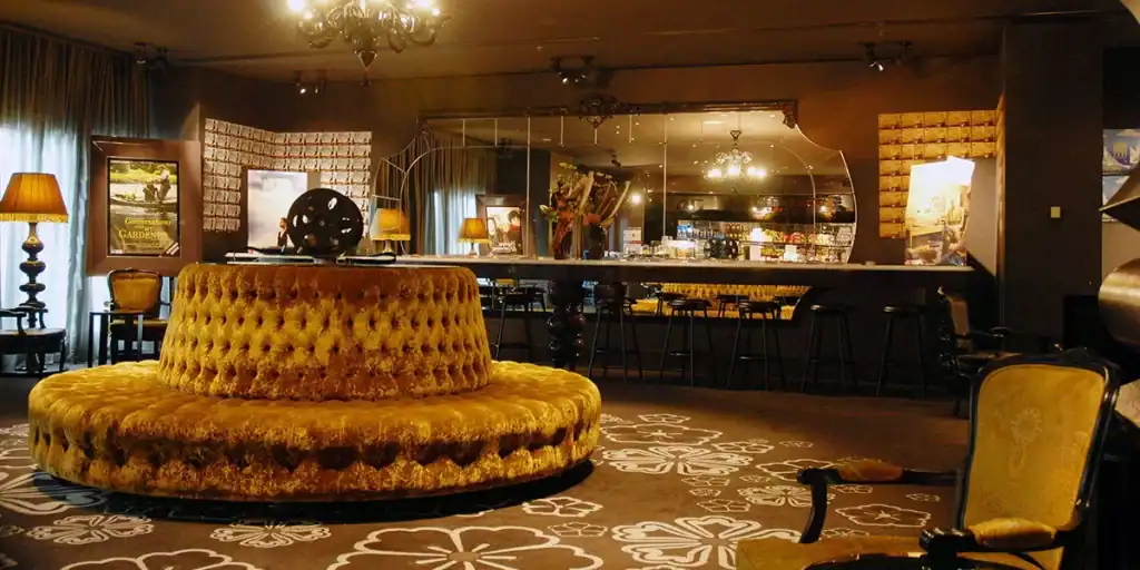 21st Century Business Equipment showroom with vintage furniture and cozy bar area, perfect for business and hospitality needs.