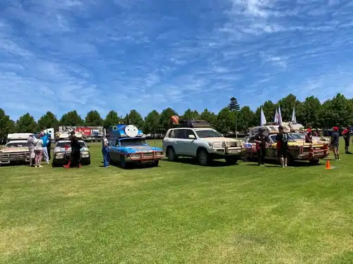 Versatile vehicles and outdoor event setup at 21st Century Business Equipment.