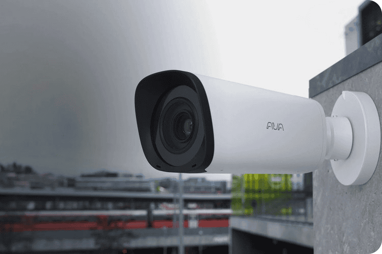 21st Century Business Equipment security camera mounted outdoors.