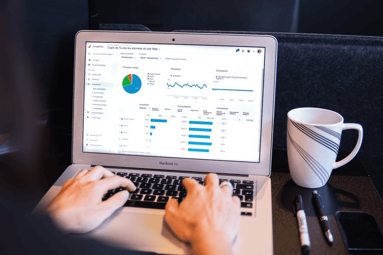 Analytics data on laptop screen representing business metrics and performance insights.
