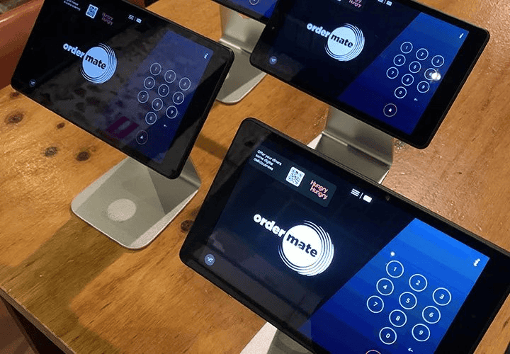 Modern digital ordering tablets at 21st Century Business Equipment.