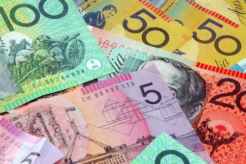 Banknotes of various denominations, Australian currency, colorful money cash background.