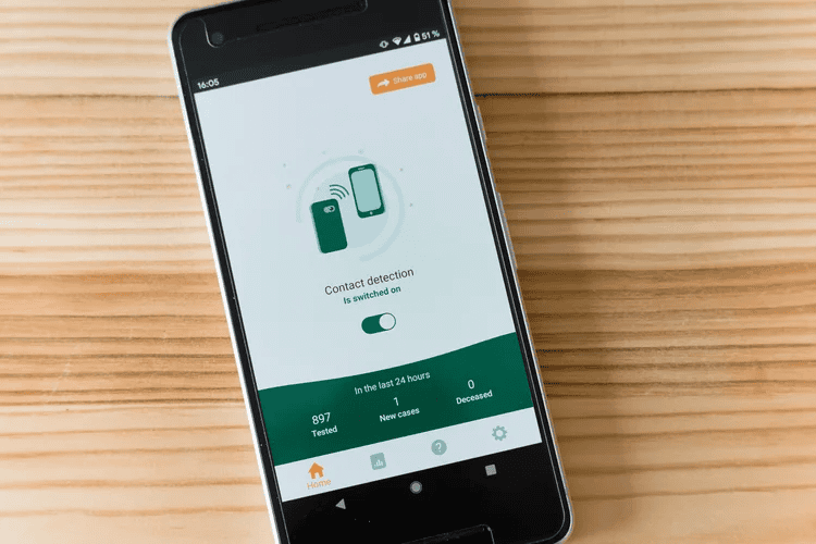 Contact detection app on smartphone screen for business equipment security.