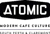 - Atomic logo on black background at Modern Cafe Culture.