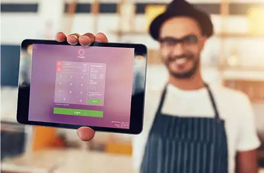 QR code scanner on tablet device in business environment.