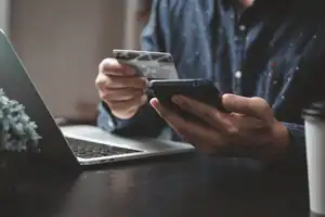 Secure mobile payment transaction using a smartphone and credit card.