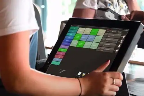 Point-of-sale touchscreen device used in retail transactions for business.