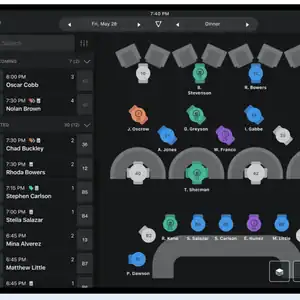 High-tech digital conference room setup with seating arrangement and presentation tools.