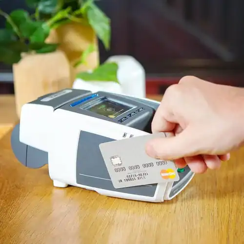 - Secure payment being processed on a modern point-of-sale terminal.