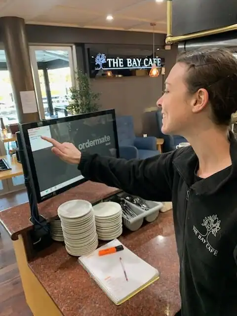 Modern touchscreen ordering system at The Bay Cafe.